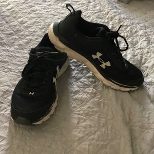 Under Armour running shoes.